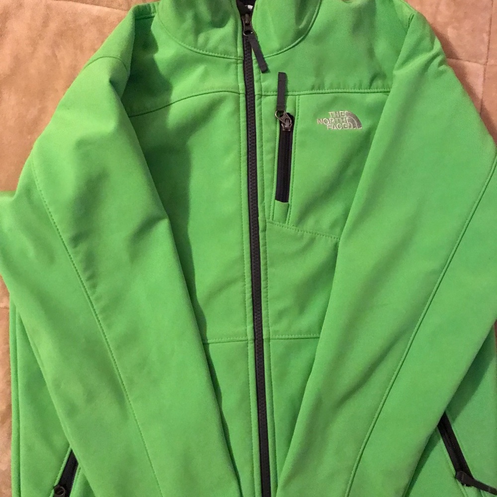 North Face Boy’s lime green with gray fleece lined jacket. Good condition.